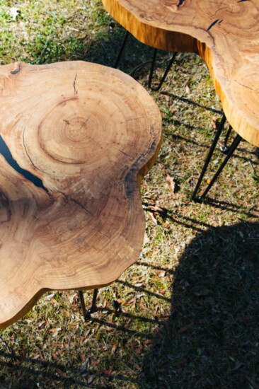  The dense and durable Elm tables exhibit a unique and attractive grain pattern.