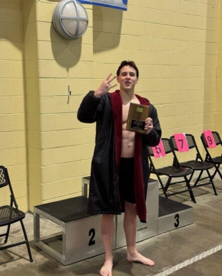 Jake winning CHSAA 4A State Swimmer of the Year