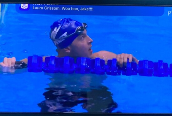 Jake telling the swimmer in the lane next to him,  "good job"at Trials.