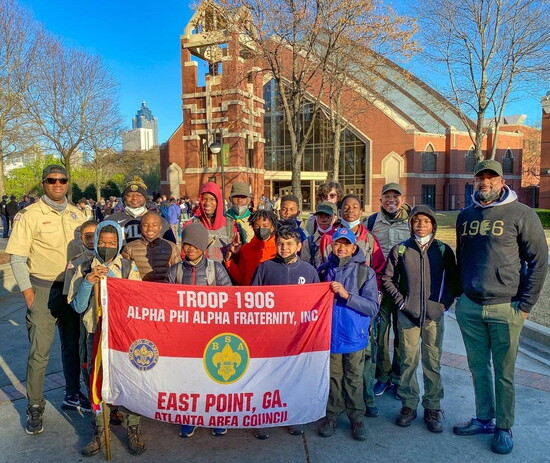 Troop 1906 members participate in various meaningful activities, like marching on Dr. Martin Luther King Day.