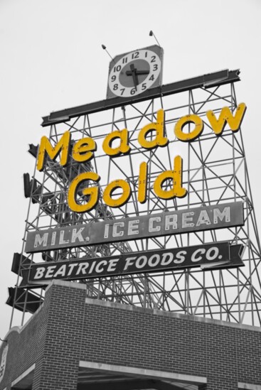 The Meadow Gold sign was constructed in 1934 by the Claude Neon company, built a few blocks from where it now stands.
