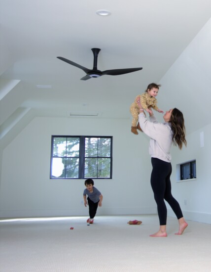 Allison and her kids in their new playroom