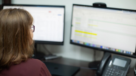 Analyzing retirement plans and investments at Safe Harbor. Photo Credit: Kerry Paradis Photography