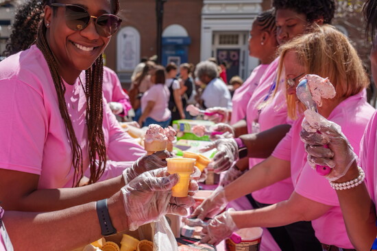 Festival activities spotlight pink foods including ice cream and pancakes. 
