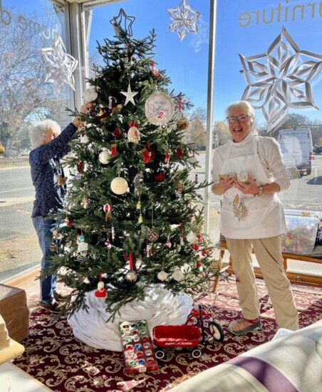 Christmas tree being decorated at Twice is Nice. Photo Credit: Twice is Nice.