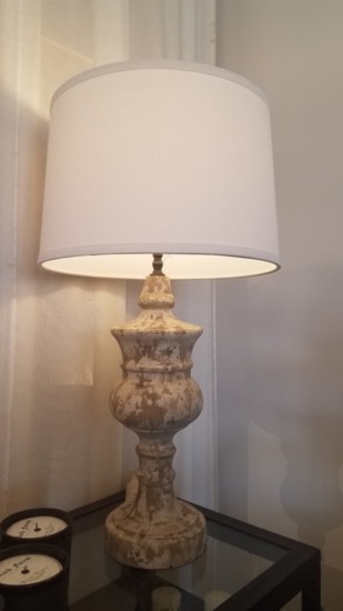 Carved wood lamp with white shade, $425, Sanctuary South, 158 Front St. (Westhaven), Franklin 