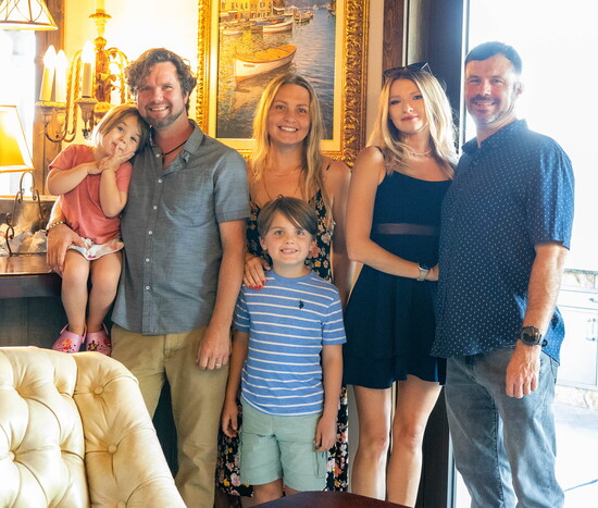 Winemaker Kyle Allen holds his daughter Lyla, with Laura, Sol, Alisa and Russ - Photo by Faith Bound Photography