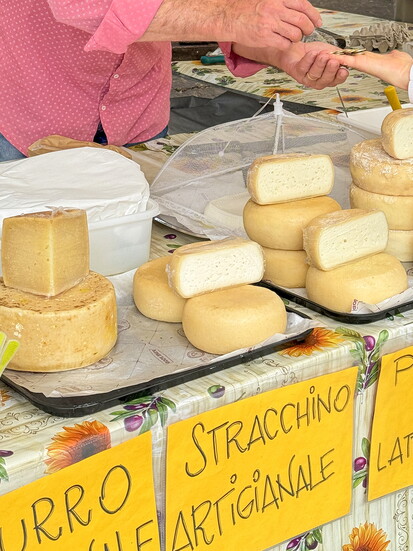 Handmade cheeses at an Italian market