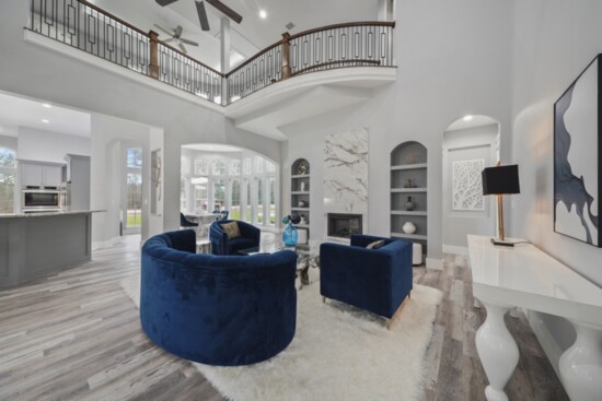 The luxurious interior selections in this new build are punctuated with a rich blue color palette accented with layers of textural and interesting decor.