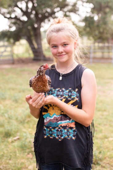 Paisley and one of her chickens, Malificent