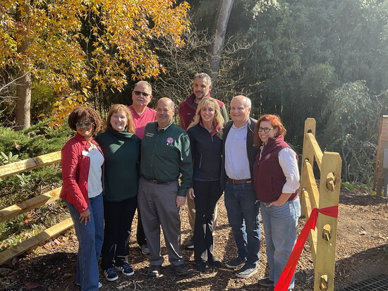 Council Members Rasheen Merritt, Marsha Peterson, Fred Reid, Elgin Akarsoy, Christen Rexing, Township Manager Barry Luber, donors Ginger & Andy Lewis