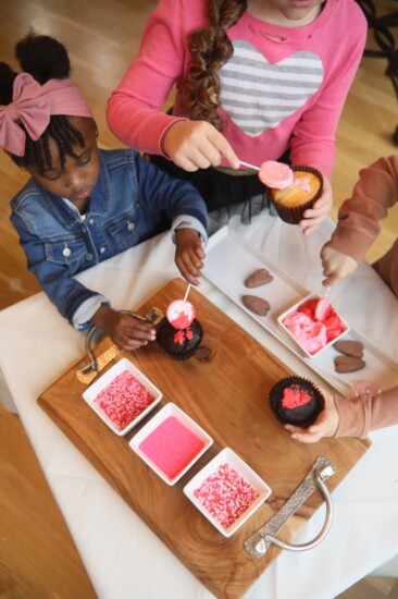 Sweet Treat Table - Delight your family with a festive Valentine's treat table featuring sweets, greenery, and handmade charm.