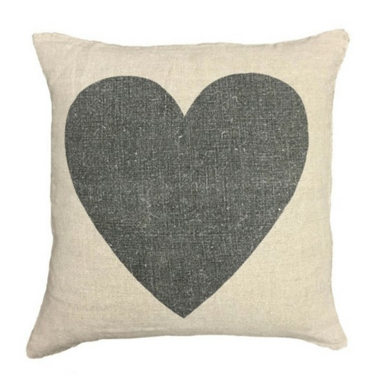 This accent pillow features a black heart on a light background and is great for a living room, bedroom, or even a nursery or child's room. Rue Boutique. 