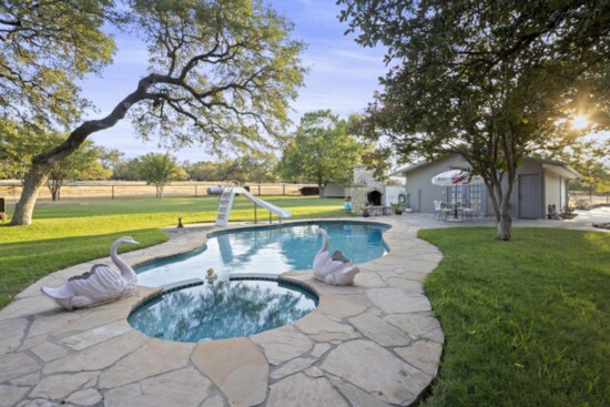 Backyard pool with hot tub (2705 FM 473)