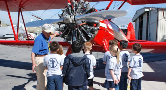 Young visitors learn aviation history during tour of Planes of Fame Air Museum.