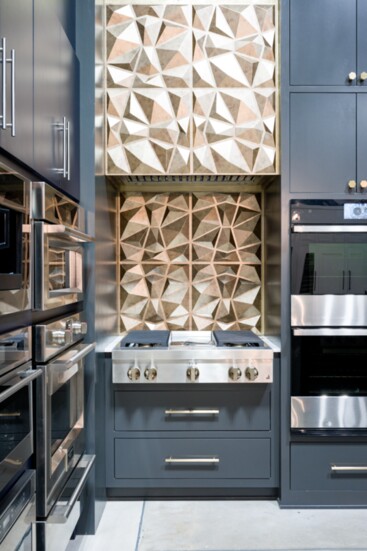 You can see a variety of kitchen layouts like this modern one by Jenn Air in Tri - Supplies ample showroom.