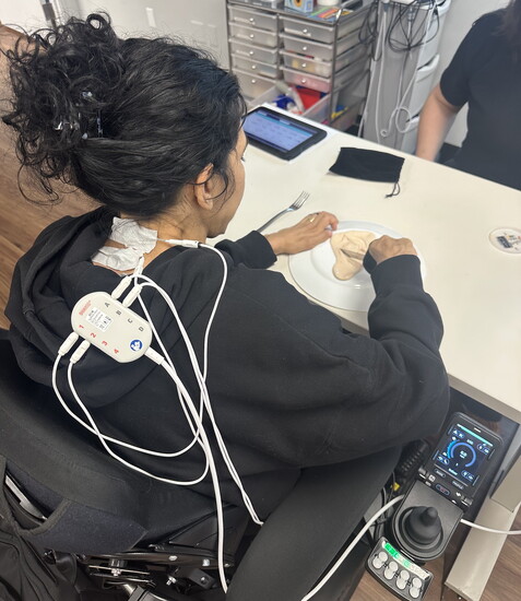 Practicing using a fork and knife