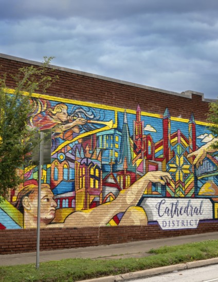 The Cathedral District mural depicting God reaching out to humanity. 