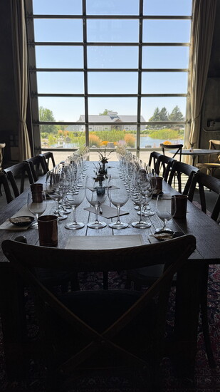 Long tasting table at Abeja In Walla Walla, tasting often becomes conversation — unhurried, communal, and deeply tied to place.
