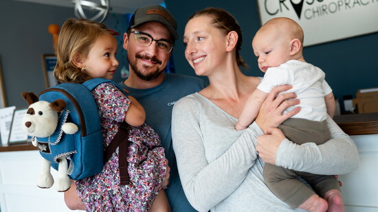Dr. Kent Replogle and Dr. Jocelyn Redlinski with daughter, Lyla, and son, Warren.