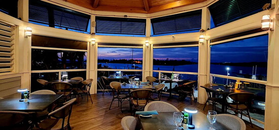 The upstairs dining room at The Crow’s Nest at sunset.