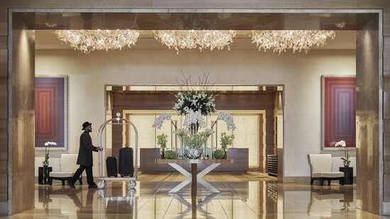 The entryway to the Four Seasons Hotel Baltimore with floral arrangements by Florals and Fancies. Photo Credit: Four Seasons Hotel Baltimore