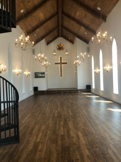 Chandeliers adorn the cathedral ceiling in the chapel.