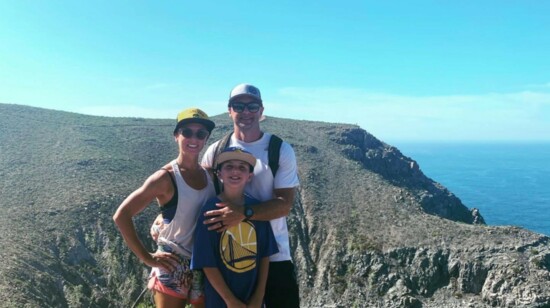 The Secan family pose on a hike