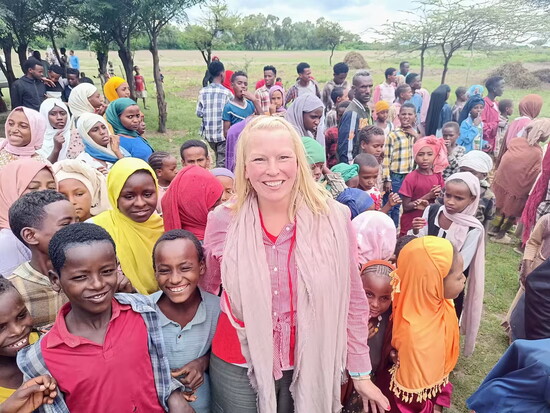 Alli Sharp, founder and board president, with children in Doddota, Ethiopia