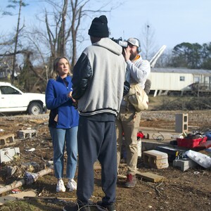 Mathis in Clarksville covering the recent December tornado aftermath. Photo credit: Alan Adkins - WTVF