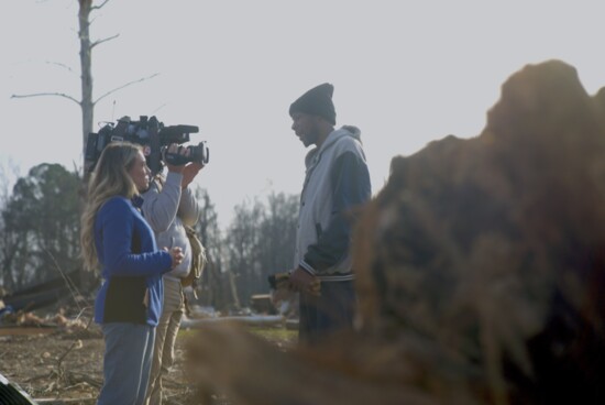 Mathis in Clarksville covering the recent December tornado aftermath. Photo credit: Alan Adkins - WTVF