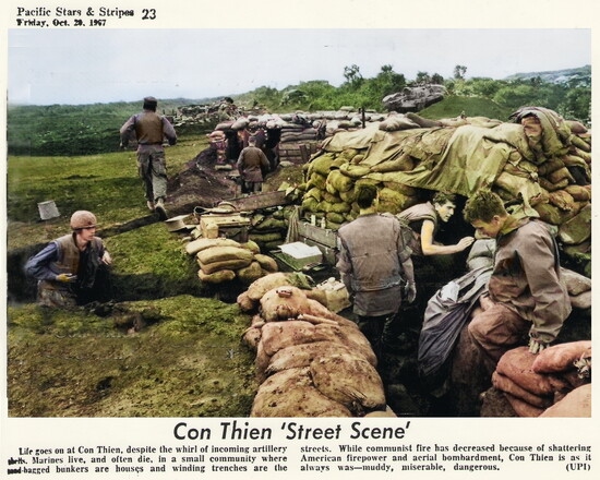 Fink, on the left with a helmet, in Con Thien ‘Street Scene.’