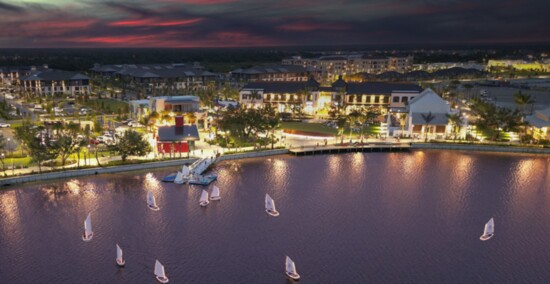 Sailboats along the lake at night is a beautiful sight in Downtown Wellen.