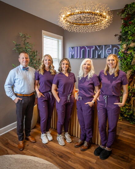 Left to right, Dr. Roderick “Matt” Huff and Erin Huff pose with team