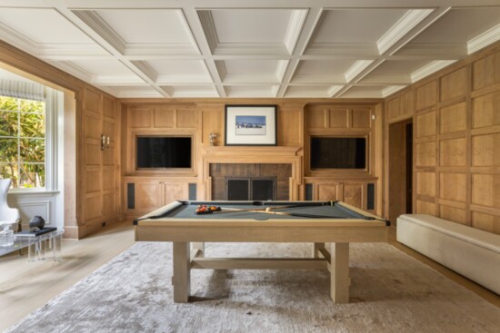 The wood-paneled billiard room