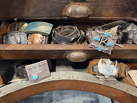 Designer silver and turquoise accessories are among the collectible pieces. 