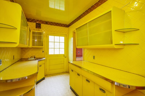 Bright yellow kitchen.