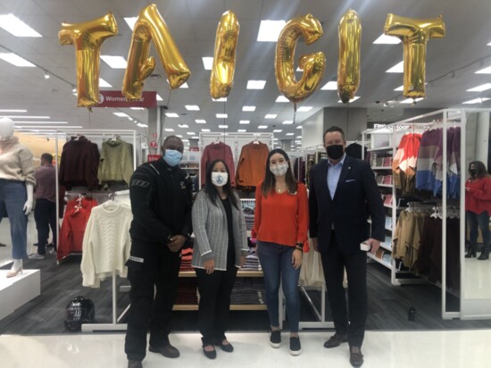 Council Members Jeremy Barksdale, Janice Zahn and Jared Nieuwenhuis with Store Director Judy Bassett in red, at the Grand Opening of Target at Wilburton Village