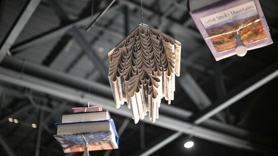 The literature-themed decor included a myriad of books and printed pages hung from the ceilings.