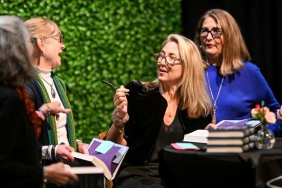 Author Lisa Jewell visits with fans while signing books. 