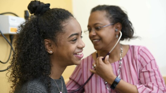 Dr. Stephenie Wallace, Associate Professor in the Department of Pediatrics at UAB, treats a local teen