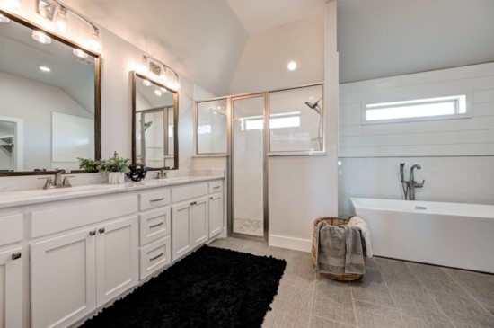 Glamour is the catch phrase for the master bathroom, which also features a double vanity counter space and spacious closets, as well as separate tub and shower.