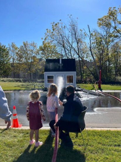 There were fire truck rides, spray house, bounce house, face painting, and more at the open house.   