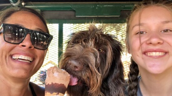 Ice cream on a hot day hits the spot for Jenn Bartlett, her Little, and one sneaky dog!