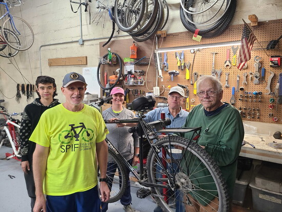 Seacoast Pedal It Forward volunteers repair bicyles like the one shown here at Port City Makerspace.