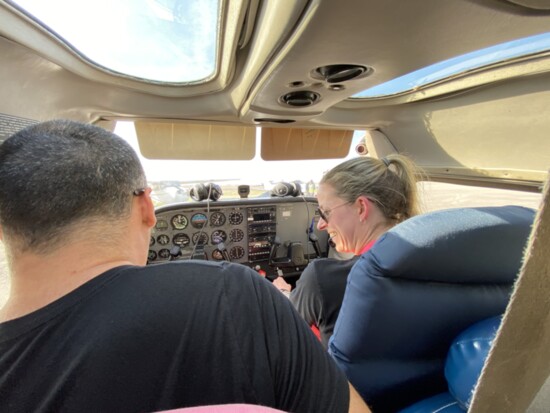 Certified Flight Instructor Bunnie Ambrose (R) at the controls prior to a flying lesson 