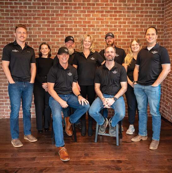 Back row, from left: Justin, Alina, Glen, Julie, Eric, Sara and Alex. Front row: Dave and Blayne