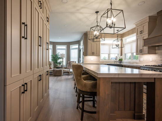 "The client shared a photo she had on her phone of a wood tone she loved, which became the cornerstone of our material selection." —Designer Kitchens