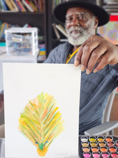 Firehouse shelter guest, Willie, with his open studio class piece