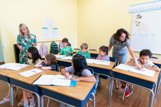 Lissa Johnson and Leah Gallo with a Russian School of Math classrom. 